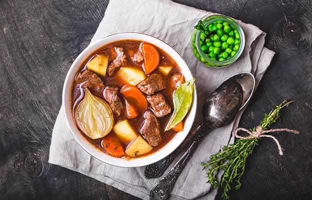 Meat stew with beef, potato, carrot, onion, spices, green peas | 9 Hearty And Healthy Dinner Recipes Your Senior Parents Will Love