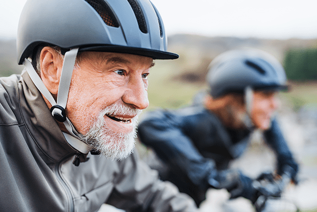 Active-senior-couple-cycling-outdoors | 9 New Hobby Ideas You Should Introduce To Your Parents