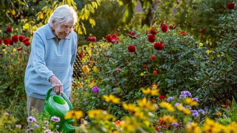 Elderly-Woman-Watering-the-Flowers | Why Independent Living Is A Great Option For Seniors