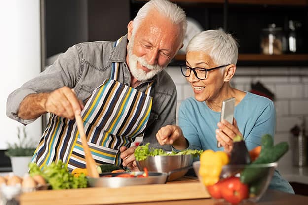 couple-prepares-their-favorite-recipe | How To Promote Brain Health In Older Adults