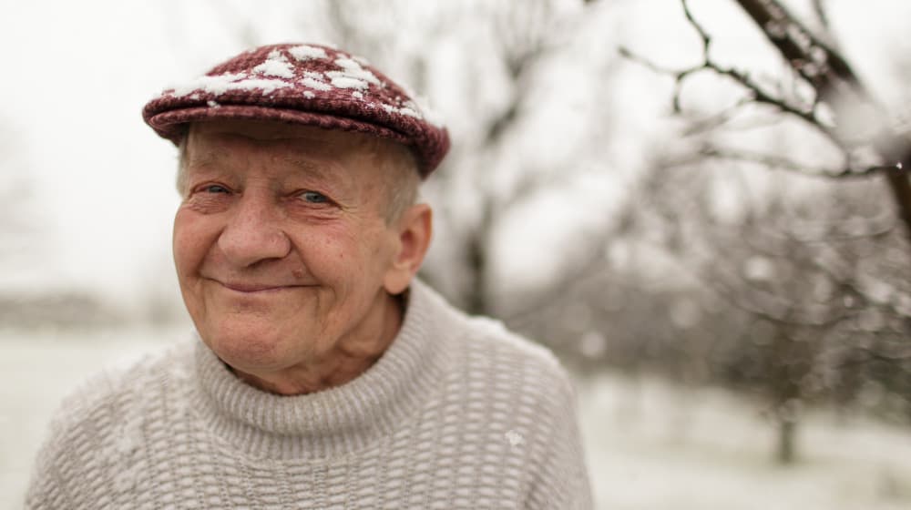 BLOG_12O_portrait-of-lovely-smiling-grandpa_Seasonal-Dangers-For-Seniors | feature | 5 Winter Safety Tips For Seniors & Caregivers
