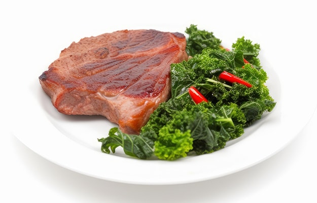 Grilled-beef-steak-meat-with-red-hot-pepper-and-fresh-raw-kale-leaf-served-on-white-plate-One-Pan-Steak-with-Beets-and-Crispy-Kale