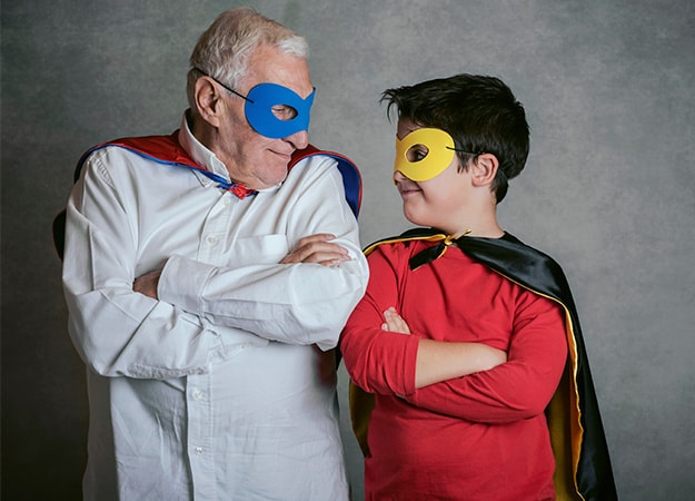 12Oaks-Grandfather With Grandson dressed as a superhero-ss-New Year_s Eve Party Theme Seven- _When I Grow Up, I Wanna Be..._