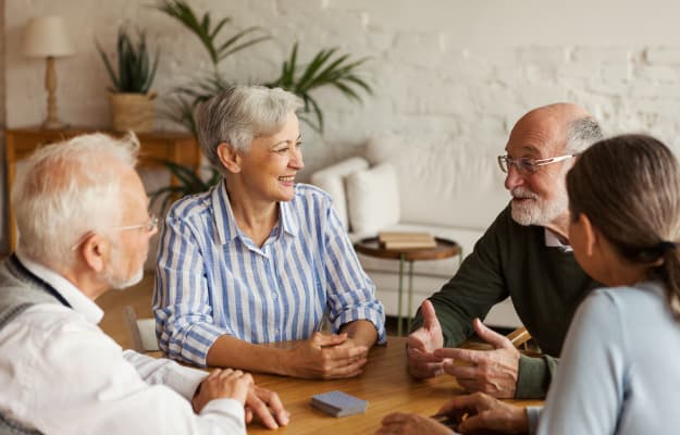 BLOG_12O_Group-of-four-cheerful-senior-friends_12-Oaks-Approach | Why Is It Important To Maintain Daily Recreational Activities For Elder Family Members?