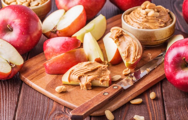 Red-apples-and-peanut-butter-for-snack_Apple-With-Nut-Butter_ss_body | 8 Scrumptious Heart-Healthy Snacks Your Senior Family Members Will Love