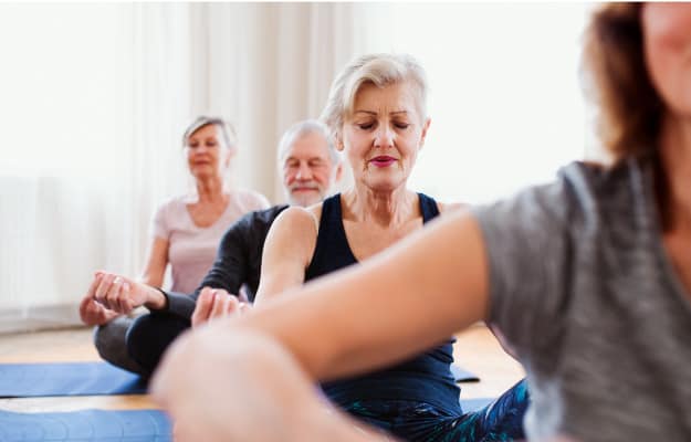 group-of-seniors-doing-yoga_Benefits-of-Yoga-for-Seniors_ss_body | 5 Amazing Benefits Of Yoga For Seniors & How To Get Started