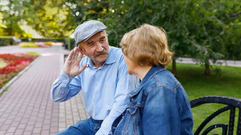Elderly-man-tries-to-hear-his-spouse.-The-life-of-retirees---6-Best-Hearing-Aids-for-Seniors-for-Everyday-Use---ss-feat