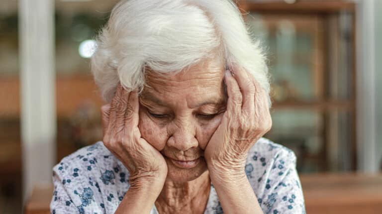 12Oaks-Asian woman with white hair shows signs of memory impairment-ss-How To Reduce Stress in Older Adults through Active Relaxation-Feature
