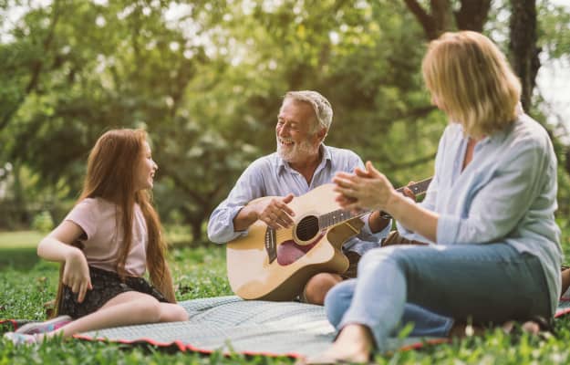 senior-play-guitar-while-going-on-picnic-with-family------------Outdoor-Activities-You-Can-Enjoy-With-------as_body