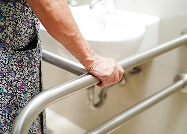 12Oaks-Elderly old woman use toilet support rail in bathroom, handrail safety grab bar-as-Attach Safety Grab Bars in Crucial Positions