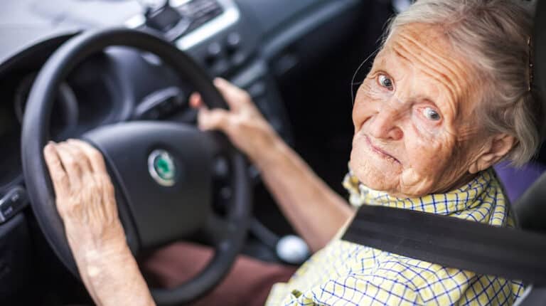 12Oaks-senior woman driving a car-as-8 Telltale Signs That Your Parents Need To Stop Driving-Feature
