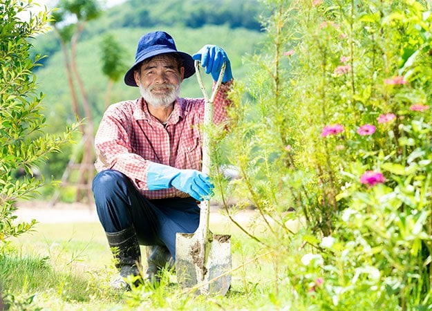 12Oaks-Active happy senior man working in the garden-as-9 Gardening