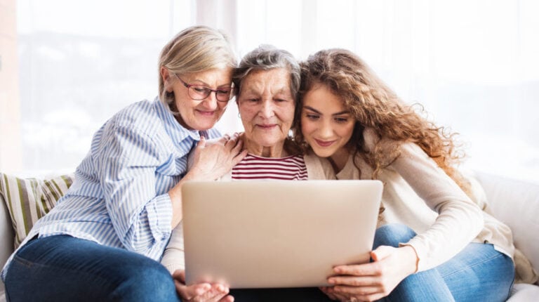 daughter-mother-and-grandmother-with-laptop-at-home-Understanding-Medicare-Tips-and-Information-for-Your-Parents