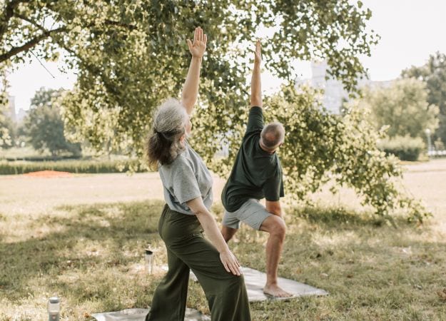 12Oaks-Elderly-couple-doing-Tai-Chi-3-Improves-Balance-and-Flexibility