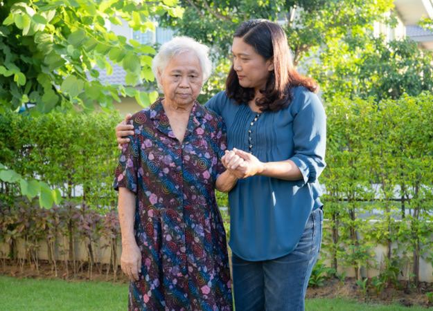 12Oaks-Elderly woman and her adult daughter walking outdoor-pexels-4 Aids in Stroke Recovery