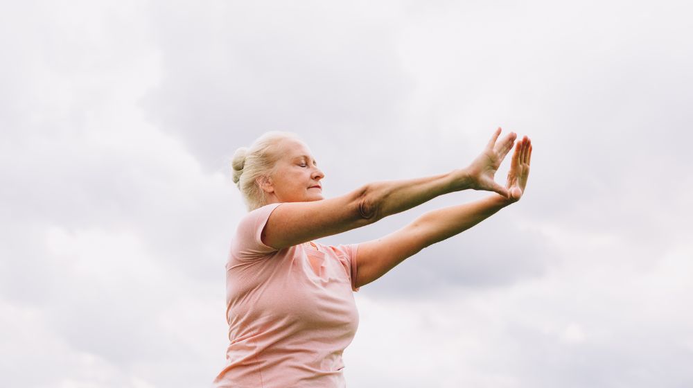 12Oaks-elderly-woman-doing-Tai-Chi-canva-The-Benefits-of-Tai-Chi-in-Older-Adults