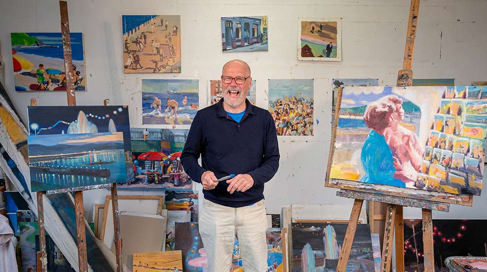 Man-Standing-in-Room-with-Paintings---Creative-Arts-for-Seniors-Exploring-Your-Parents_-Artistic-Side---px-feat
