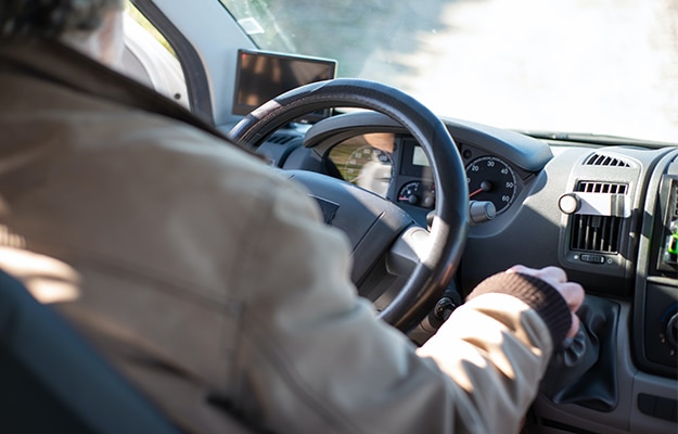 person-in-white-long-sleeve-shirt-driving-car-Practice-Safe-Driving-Tips-px-body