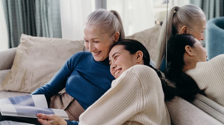 Elderly-Woman-and-Young-Woman-Laughing-Together-The-Power-of-Chuckles-Exploring-the-Benefits-of-Laughter-for-Seniors