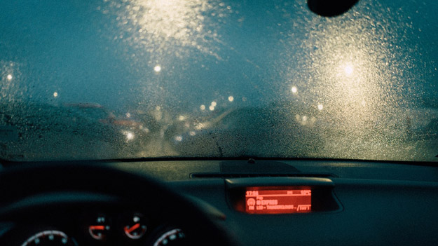 inside-view-of-a-car-under-rain-Avoid-Extreme-Weather