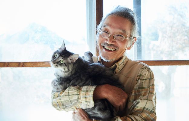 12Oaks-Elderly man holding his cat-cnv-4 Pets Help Lower Stress