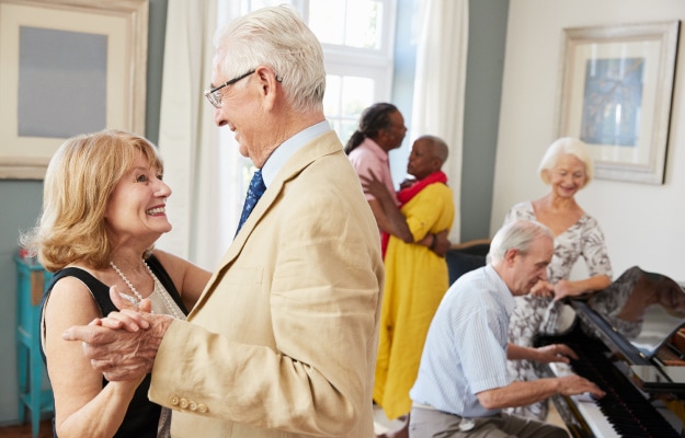 group-of-happy-senior-couple-dancing-in-dance-club-The-Benefits-of-Dance-In-Seniors-6-Promotes-Stronger-Bones