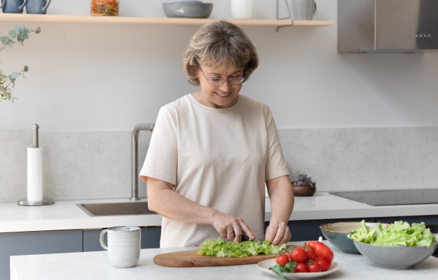 senior-women-preparing-several-vegetables-Hydration-Tips-for-Seniors_2-Eat-Water-Rich-Foods