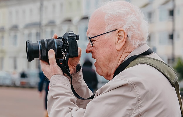 A-Man-with-a-Camera-Bird-Watching-for-Seniors-Keep-The-Minds-Active