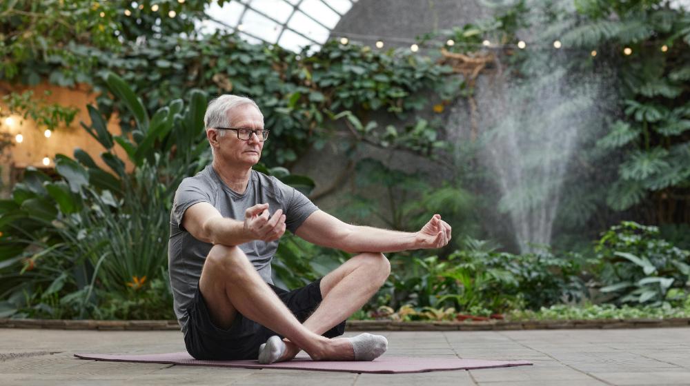 Man Practicing Yoga | leg strengthening exercises for seniors px featured image