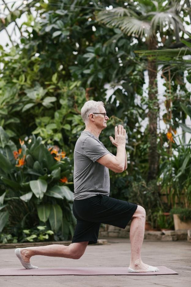 Man Practicing Yoga | leg strengthening exercises for seniors px