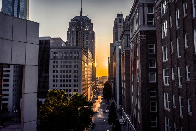 people walking on pedestrian lane near high rise buildings during daytime fun activities in okc for adults us