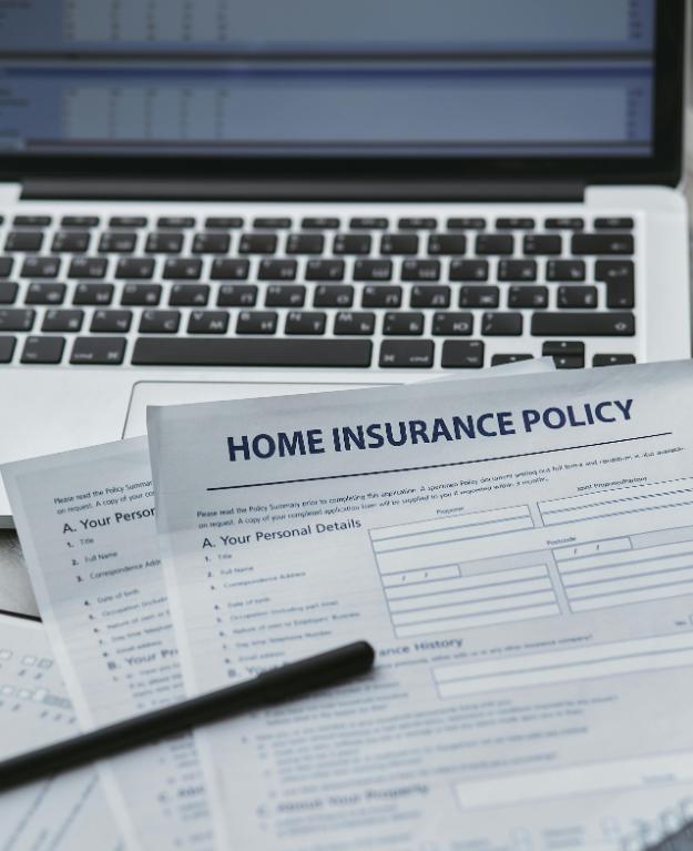 Home Insurance Policy on a Laptop px (1)