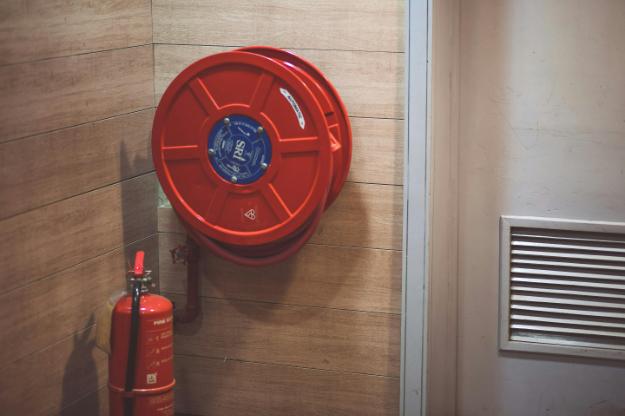 Red Fire Extinguisher below Hose Reel px (1)