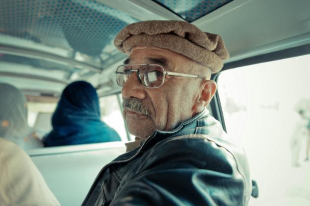 Photo Of Man Wearing Eyeglasses _ thanksgiving travel tips for seniors px