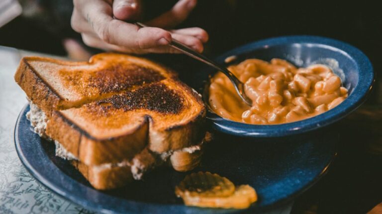 plate of toasted bread and bowl of pork and beans featured image us